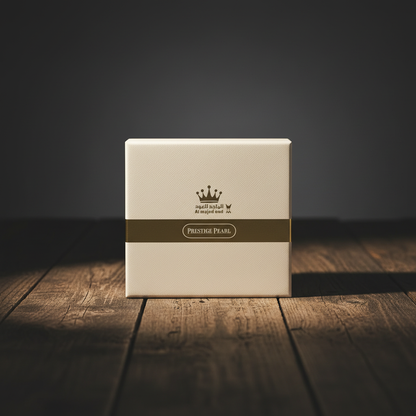 Prestige Pearl EAU DE PARFUM by Al Majed Oud — Bottle in open cream-white gift box