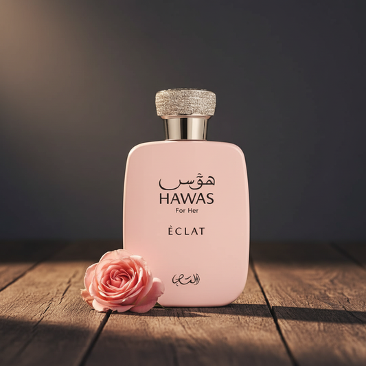 Hawas For Her Éclat perfume bottle with rose prop lifestyle shot