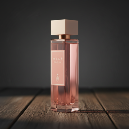 Miss Flora perfume bottle three-quarter angle on dark wood surface