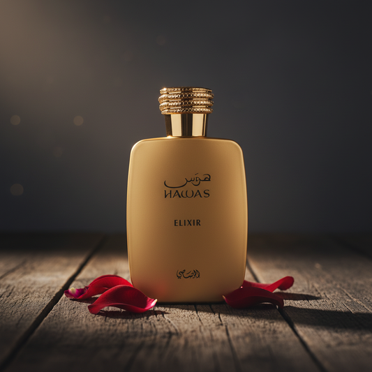 Hawas Elixir perfume bottle lifestyle shot with rose petals on dark wood