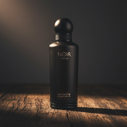NOIR Parfum by Al Majed Oud — Hero Front shot on dark wood surface