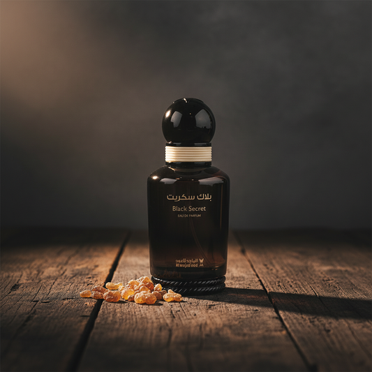 Black Secret Eau de Parfum lifestyle shot with frankincense resin crystals on dark wood