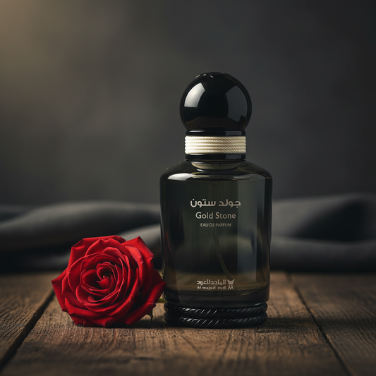 Gold Stone EAU DE PARFUM by Al Majed Oud — Lifestyle shot with single rose bloom