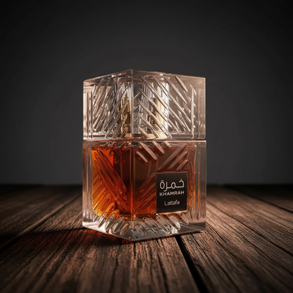 Khamrah by Lattafa perfume bottle three-quarter front angle on dark wood surface