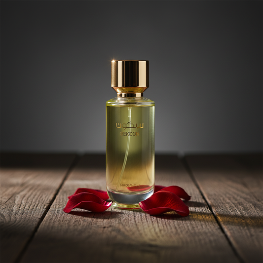 Sekoon Eau de Parfum lifestyle shot with rose petals on dark wood