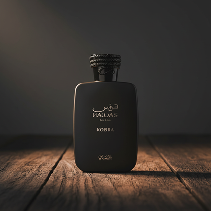 Hawas Kobra by Rasasi – Hero Front, dark studio, warm directional light