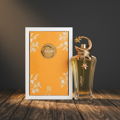 Kawkab perfume box packaging saffron orange with gold medallion