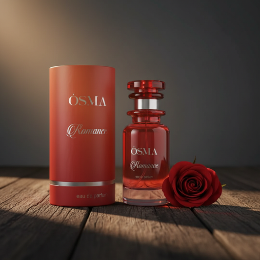 OSMA Romance perfume bottle lifestyle shot with rose prop on dark wood